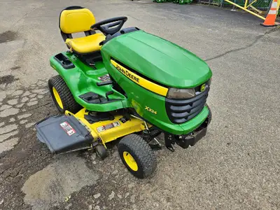 I am selling my John Deere X324 lawn tractor. The tractor has ~1200 hours on it. It has 4 wheel stee...