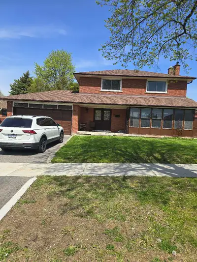 Main floor 4 bedroom 1 full bath and one 1/2 bath kitchen and two living rooms and Laundry. Basement...