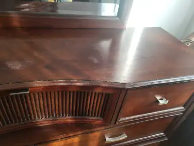 Brown Wood dresser with a mirror, View more