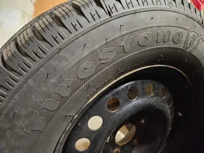 Set of 4 Firestone Winterforce 2 tires on steel rims 225/70R16. Excellent treadwear remaining on tir...