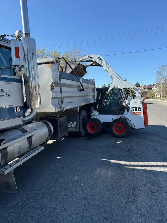  dump truck in Bobcat service 587-436-3333 63008304990211121