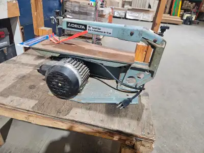 Nice little delta scroll saw with extra blades $50obo call or text 651 0830