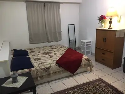 Private, furnished spacious room for rent on the ground floor unit in a house. Can be shared by 2-pe...