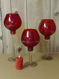 Red/Christmas goblet and other candle/other holders, etc.