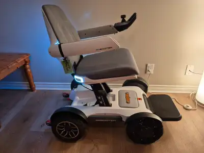 Robooter X40 By Mobilist. It lights up. It folds up. It talks to you. Omni-directional front wheels....