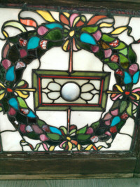 Antique stained glass window - Christmas wreath motif