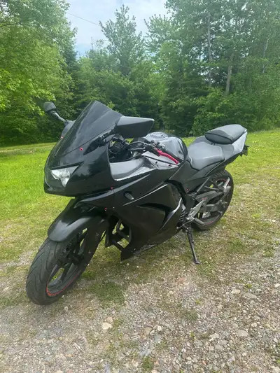 Selling my Kawasaki Ninja 250ex. Bike runs and drives great. Plastics arnt perfect but was just into...
