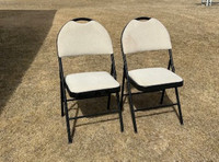 Two Padded Metal Folding Chairs