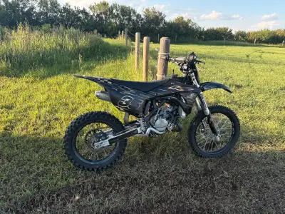 Selling my sons upgraded 2018 kx100. Selling it due to the reason he wants to get into street riding...