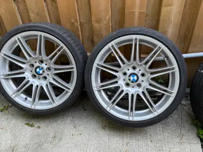 Original BMW 19-inch staggered alloy wheels with tires. They are in good shape — no cracks or bends....