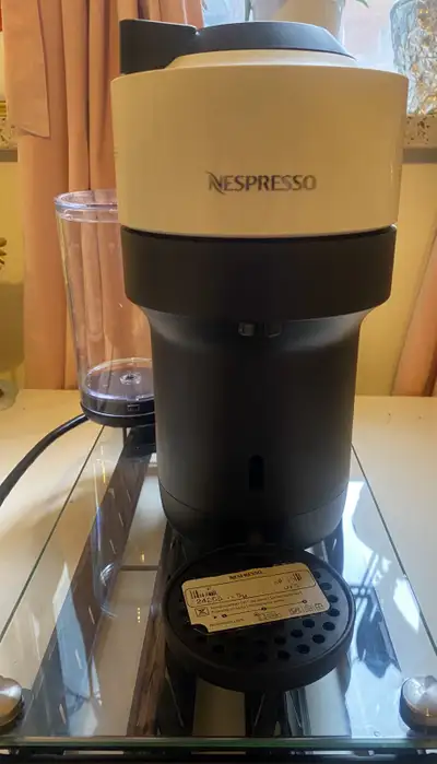 Nespresso coffee maker + Vertuoline coffee capsule holder, View more