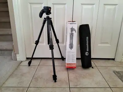 For Sale an older but in New Condition, Manfrotto Compact Action Tripod. This tripod is designed for...