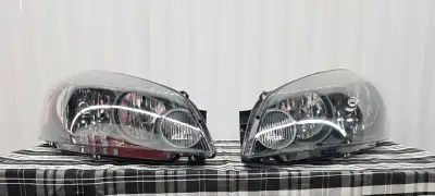 *Located in Niagara* This is a really nice new set of aftermarket headlights for the following: Chev...