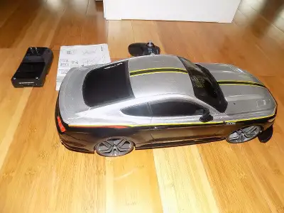 New RC Car, 45 Kids VHS tapes, Parking Garage, Easy Bake, View more