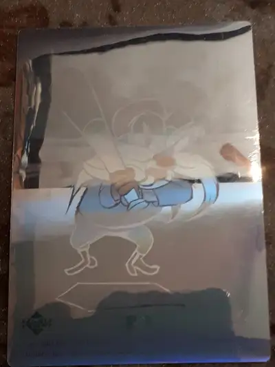 I have five 1990 Upper Deck Looney Tunes Comic Ball hologram stickers. They are: 1. Sylvester in Bal...