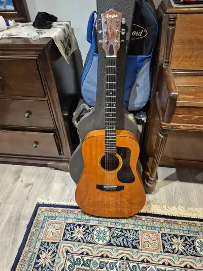 A beautiful acoustic is waiting to be in your hands for the enjoyment of playing songs. Price is neg...