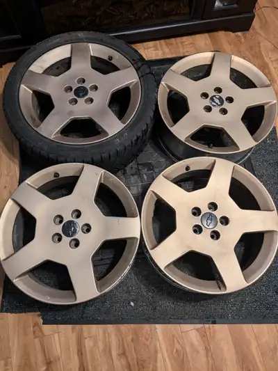 4-18 inch aluminum rims in good condition one has a tire on it but will be removed before sale bolt...