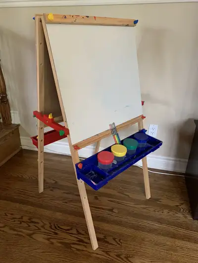 Melissa and Doug art easel which easily adjusts to the height of your growing child. It is a multius...