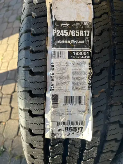 Pair of brand new Goodyear Wrangler tires , no plugs, no cracks, never installed on rims.