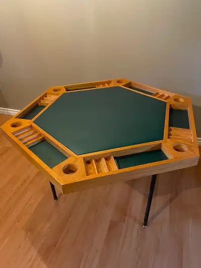 Custom made poker table. It has seen a lot of hands of poker but is still in great shape. Height: 74...
