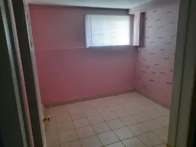 4 bedroom town house with basement finished quite environment, no smoking and no pets allowed. Bus s...