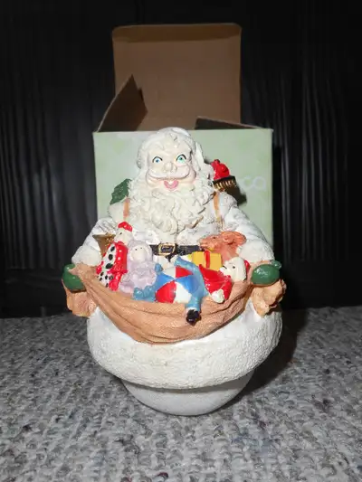 Santa Claus wind up musical decoration from 1992., View more