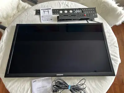 40” TV (not smart) with wall mount, View more