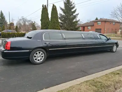 126 inch, 9 passenger stretch limousine 1 owner ordered from DaBryan Three 3-passenger bench seats B...
