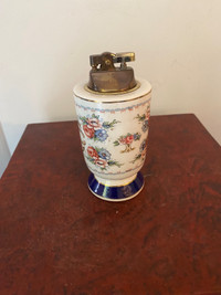 Vintage table top porcelain petrol lighter.5.5”tall.