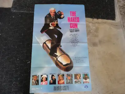 The Naked Gun Movie Poster, View more