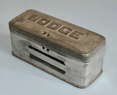 This is an antique 1930's LODGE Spark Plug tin box made in England. The box is in very good conditio...