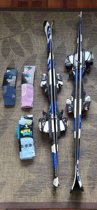 Two Rossignol Sean junior ski 120cm /130cm c/w Ski boots, poles