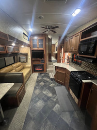 2013 Heartland fifth wheel with 2 bedrooms and outdoor kitchen 