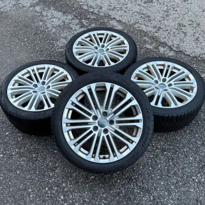 18" Audi A5 - S5 Original Silver Rims and Pirelli Ice Zero FR Winter Tires. Wheels and tires are in...