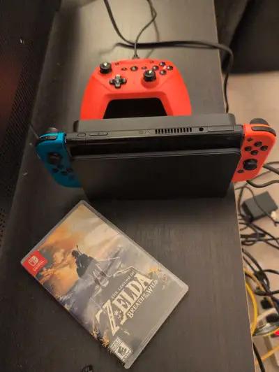 Brand new switch oled, controller, and breath of the wild. Pick up only