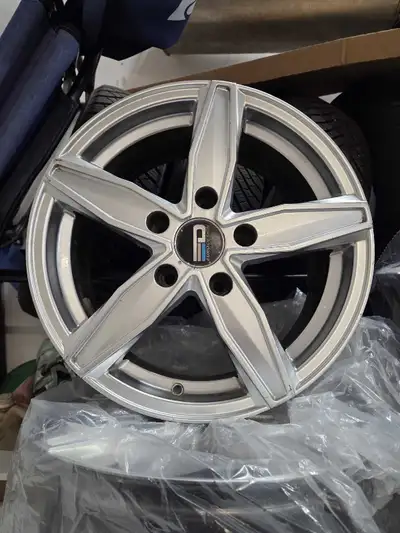 5x120 not sure the offset nice rims Bought them to fit my caddi but wont work selling $200