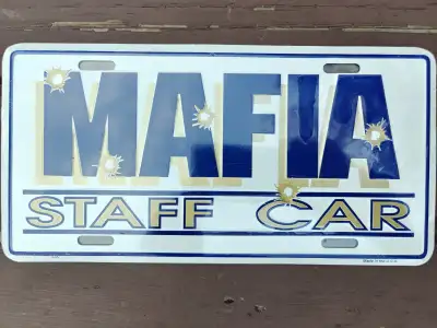 Brandnew in shrink-wrap USA made novelty gag metal car plate, View more