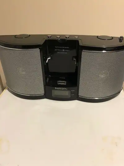 Compact portable AM/FM speaker alarm clock with aux input, View more