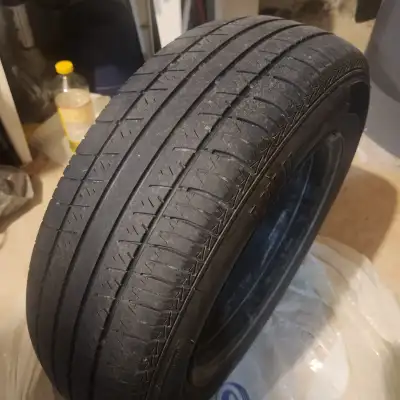 1 tire with rim continental 195/65 R15 all season a little used and worn, another one the same as th...
