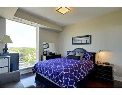 This modern, sun-filled 2-bedroom, 2-bathroom condo in Westboro features stunning panoramic views, h...