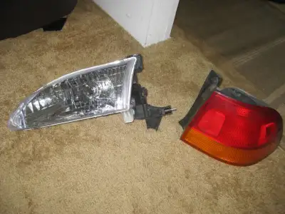 A) 1998 Toyota Corolla front lamp passenger side. Price... $30 B) Honda Civic RS rear lamp right han...