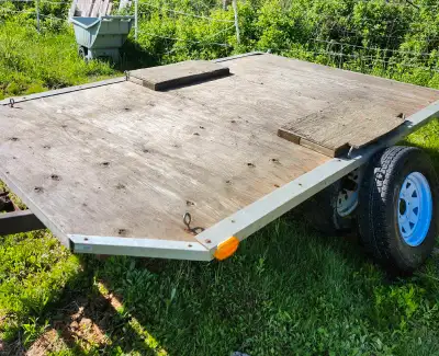Deck trailer 9' x 6' lights work comes with hitch. 8 tie points. 1/2 " plywood decking. Located by a...