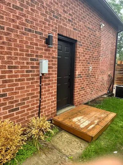This newly renovated 2-bedroom basement apartment features a modern kitchen with stainless steel app...
