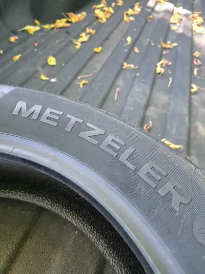 Two brand new tires, sizes are in the photos.$350 or best offer.7