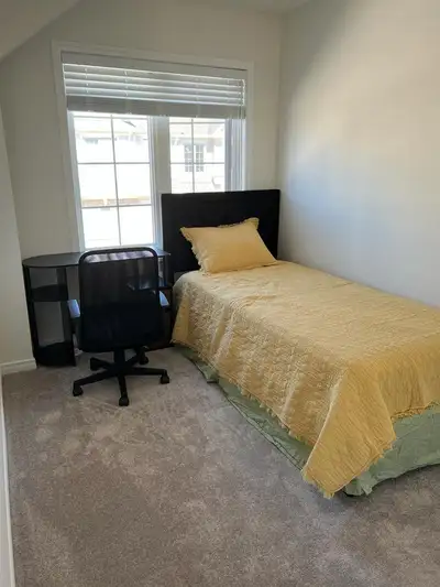 Two Fully furnished rooms with a shared Bathroom in a New Townhouse in Oshawa is available for Lease...