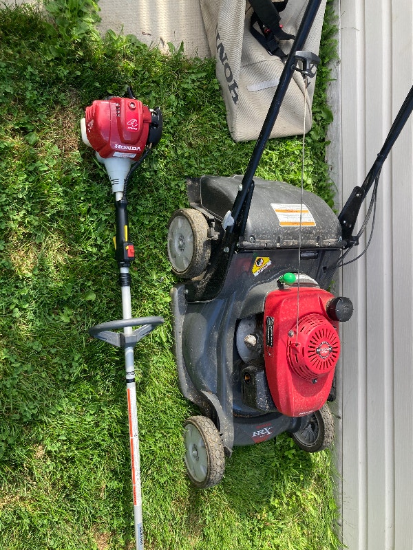 Honda HRX217 self propelled lawn mower n straight shadt trimmer