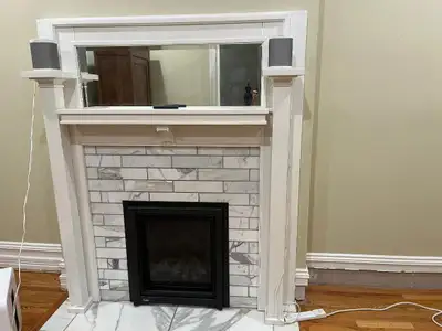 Doing renovations in our old home and removed a fireplace mantel replica of the 1900's era with vint...