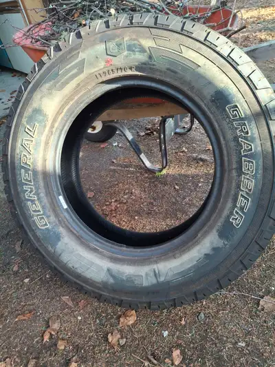 Three almost new 265/70 R18 truck tires $50 each.