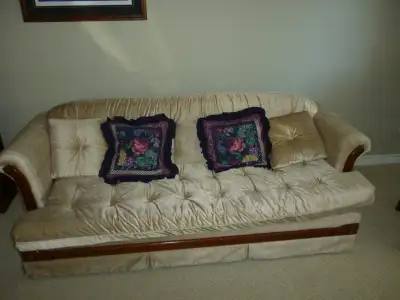Beige sofa for sale. Please call Sean at 709-759-0039 (cell) or 709-388-2694 if you are interested.
