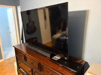 Selling a used Sony 55-inch LCD TV, model KDL-55HX751, in good working condition. This TV delivers a...